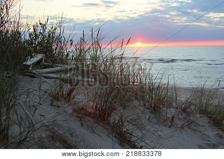 Sunset beautiful landscape on the Baltic Sea coast sand dunes