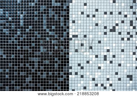 Decorative gray, white and black mosaic tiles background.