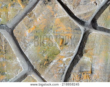 Texture of masonry. Cobblestone. Photo of stone paving. Natural stones used in architecture. Stone texture.