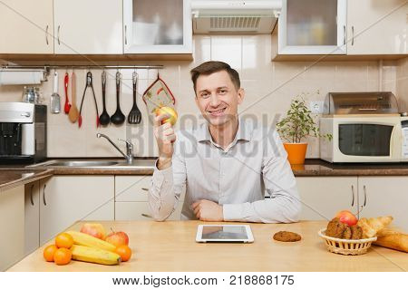 Perturbed Young Business Man In Suit, Shirt, Having Breakfast, Sitting At Table With Tablet, Spreadi