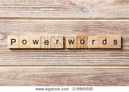 POWER WORDS word written on wood block. POWER WORDS text on table concept.