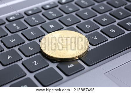bitcoin on laptop keyboard exchage crypto currency mining