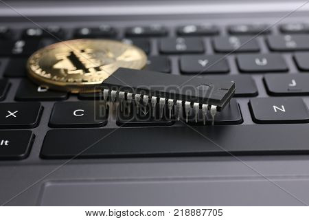 bitcoin on laptop keyboard exchage crypto currency mining