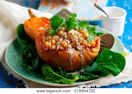Butternut Squash with Chickpeas Tahini and Za'atar.selective focus