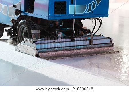 Special machine ice harvester cleaning the ice rink