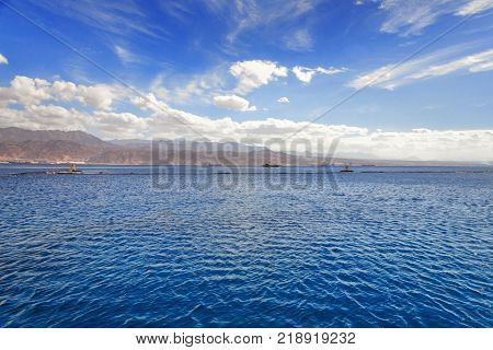 Spectacular blue sky view near the mountains and calm red sea