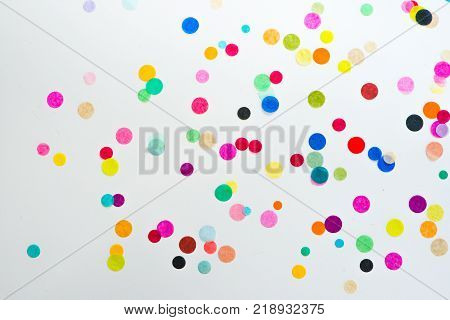 Festive party or carnival confetti on pink background