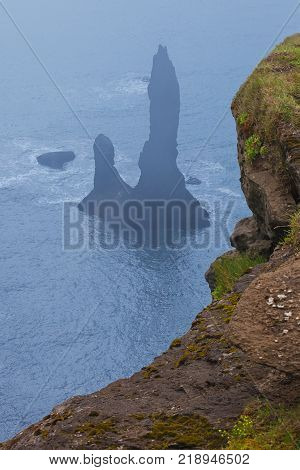 Famous Reynisdrangar cliffs at south coast of Iceland