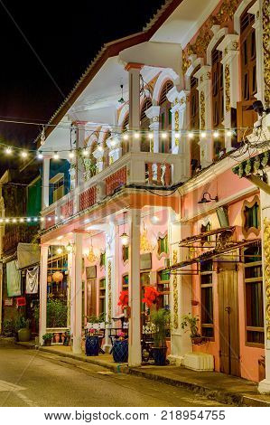 Small street in old town in Phuket town at evening, Thailand.