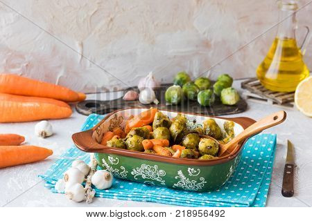 Useful and dietary dinner of caramelized brussels cabbage and carrots