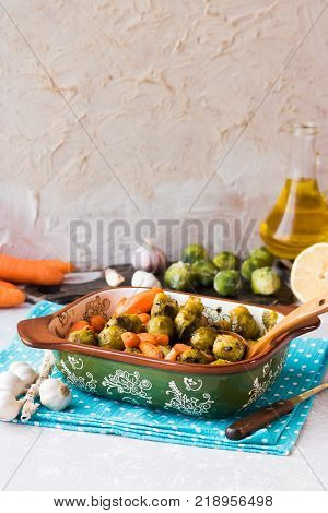 Useful and dietary dinner of caramelized brussels cabbage and carrots