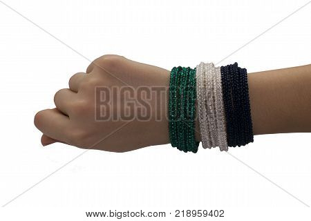 Green white and black bracelet mock-up on a man's hand. Empty layout of the design of wrist banners. Cheap bracelets isolated. Bracelet from beads.