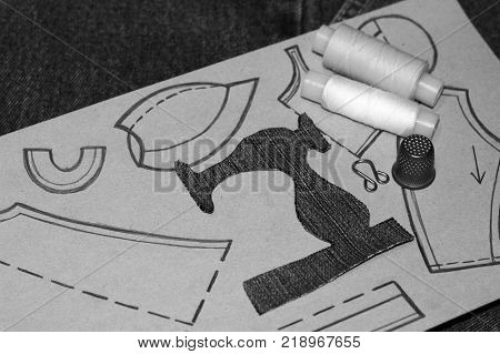 A Stencil Of A Sewing Machine Of Jeans, Drawing Clothing On Paper