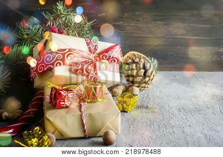 Red Christmas  Gift  Box With Red Ribbon And Fir Branches