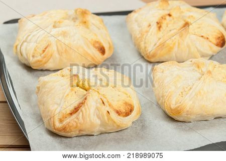 Homebaked Hungarian Cheese Puff Pastry Parcels. Iced Sugar