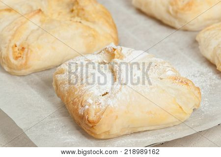 Homebaked Hungarian Cheese Puff Pastry Parcels. Iced Sugar