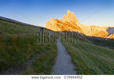 Gardena valley wonderful Seceda peak the Odle mountain range in the Dolomites at sunset in Italy