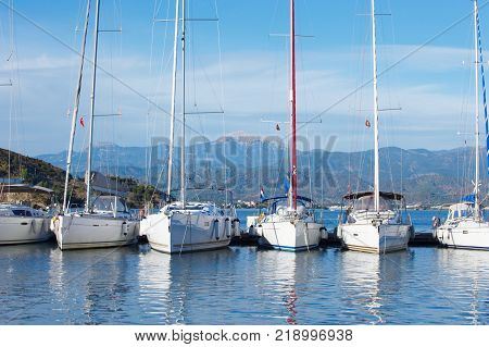 marina at summer day with moored yachts in Fethiye Turkey