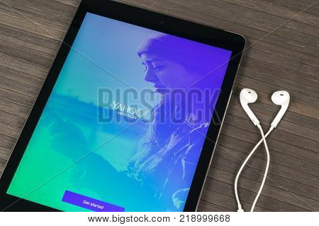 Sankt-Petersburg Russia December 20 2017: Yahoo Messenger mobile application on Apple iPad monitor screen. Yahoo messenger homepage app. Tablet starting social media app.