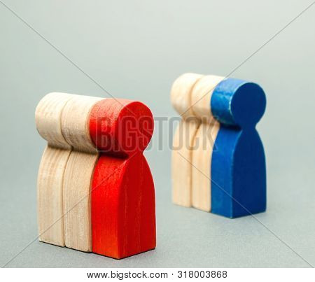 Groups Of Multicolored Wooden People. The Concept Of Market Segmentation. Target Audience, Customer 