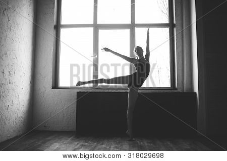 Plasticity Slim Woman Dancing Near Window. Professional Dancer Enjoy Dance. Lady Dancer Training Mod