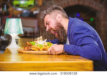 Enjoy Meal. Cheat Meal Concept. Hipster Hungry Eat Pub Fried Food. Manager Formal Suit Sit At Bar Co