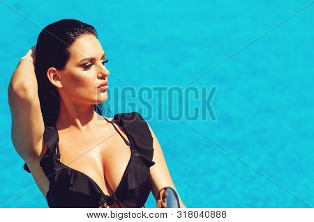 Fashion Photo Of Beautiful Sexy Woman With Brunette Wet Hair In Luxurious Swimming Suit Relaxing In