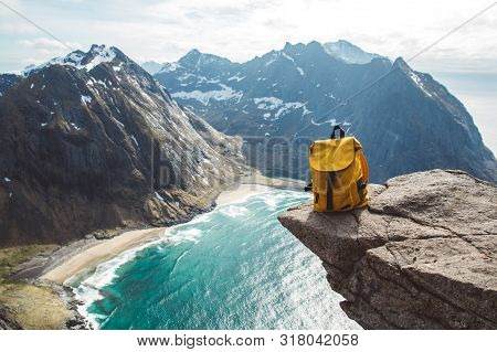 Hiker Tourist Yellow Backpack On Rock In Mountain, Panoramic Landscape, Traveler Relax Holiday Conce