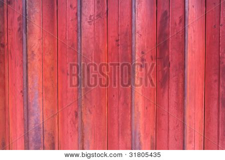 Pozadí v víno červené barvě. Kovové textura.