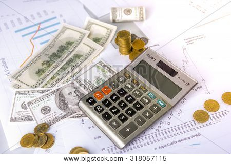 Investors Are Calculating Profits And Interest Rates Using A Calculator And Have A Small Amount Of M
