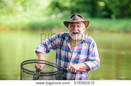 I Am Retired. Summer Weekend. Fisherman With Fishing Rod. Pothunter. Man Catching Fish. Retired Bear