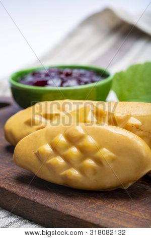 Oscypek Or Oszczypek Smoked Cheese Made Of Salted Sheep Milk Exclusively In Tatra Mountains, Zakopan