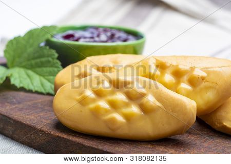 Oscypek Or Oszczypek Smoked Cheese Made Of Salted Sheep Milk Exclusively In Tatra Mountains, Zakopan