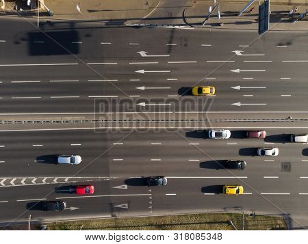 Imsge from above of asphalt road and riding cars