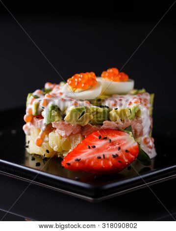Round Salad Made Of Red Fish Potato And Avocado