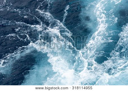 Wave Created By Ship Sails Pass Through The Sea Water. Turbulance Flow Of Sea Water Happen By The Sh