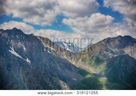 Dyllic Summer Landscape With Hiking Trail In The Mountains With Beautiful Fresh Green Mountain Pastu