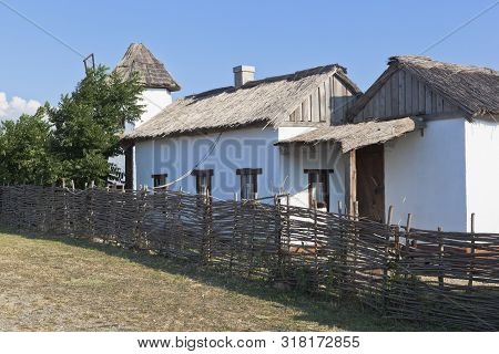Taman, Temryuk District, Krasnodar Region, Russia - July 17, 2019: Cossack House With A Mill In The 