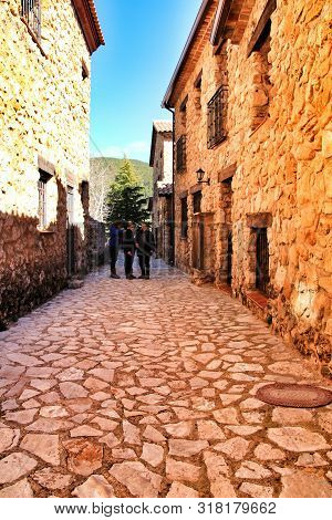 Riopar Viejo, Albacete, Spain- February 8, 2019: Tourists Visiting And Walking Through Cobbled Stone