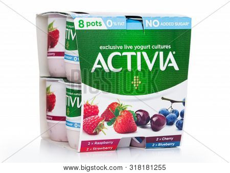 London, Uk - August 18, 2019: Pack Of Activia Exclusive Live Yogurt Cultures With Berries On White B