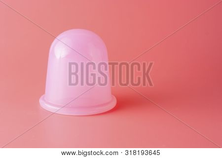Silicone Massager For Body, Silicone Vacuum Massage Cap Over Pink Background, Copy Spce.