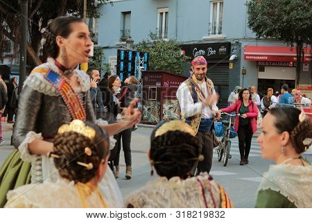 Valencia, Spain- March 12, 2018: Women Falleras Majors Of Valencia Chatting, Dressed In The Typical 