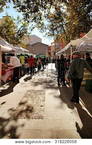 Elche, Alicante, Spain- December 1, 2018: People Buying In The Local Ecological Market In The Main S