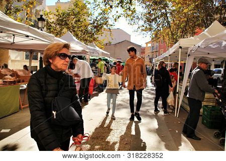 Elche, Alicante, Spain- December 1, 2018: People Buying In The Local Ecological Market In The Main S
