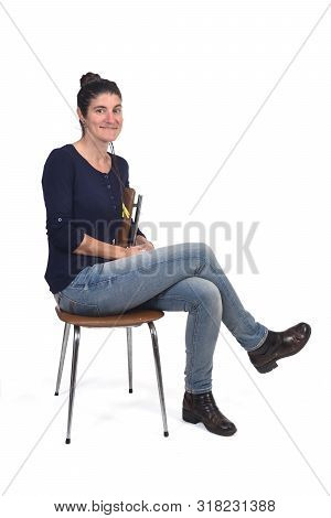 Woman Sitting In A Vintage Chair Isolated On White