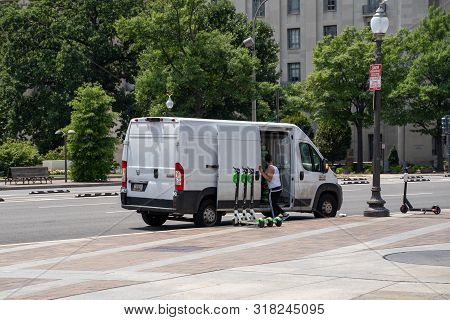 Washington, Dc - August 4, 2019: A Van With A Lime Scooter Charger, Known As A Juicer, Places The Do