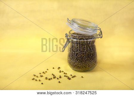Mung Bean In A Jar On A Yellow Background. Copy Spaes.