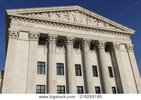Supreme Court Of The United States Rear Facade. Justice The Guardian Of Liberty Is Printed Below The