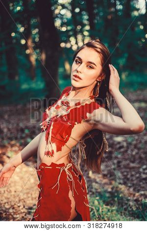 Gorgeous Beauty. Amazon Woman. Sexy Witch. Ethnic Tribal Fashion. Deep Forest. Wild Woman In Forest.