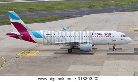 Airplane Taxi In Dusseldorf Airport